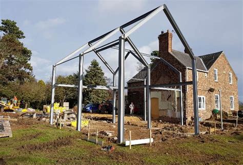 metal house extension|metal building expansion plans.